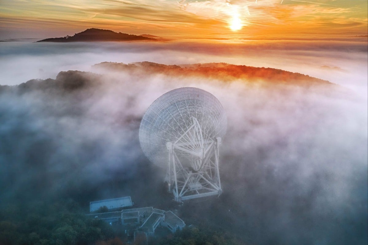 This handout photograph released on June 29, 2023 shows the Max Planck Institute for Radio Astronomy’s Radio Telescope Effelsberg near Bad Munstereifel. Astronomers across the world announced on June 29 that they have found the first evidence of a long-theorised form of gravitational waves that create a “background hum” rumbling throughout the universe. Photo: Norbert Tacken/ Max Planck Institute for Radio Astronomy / AFP