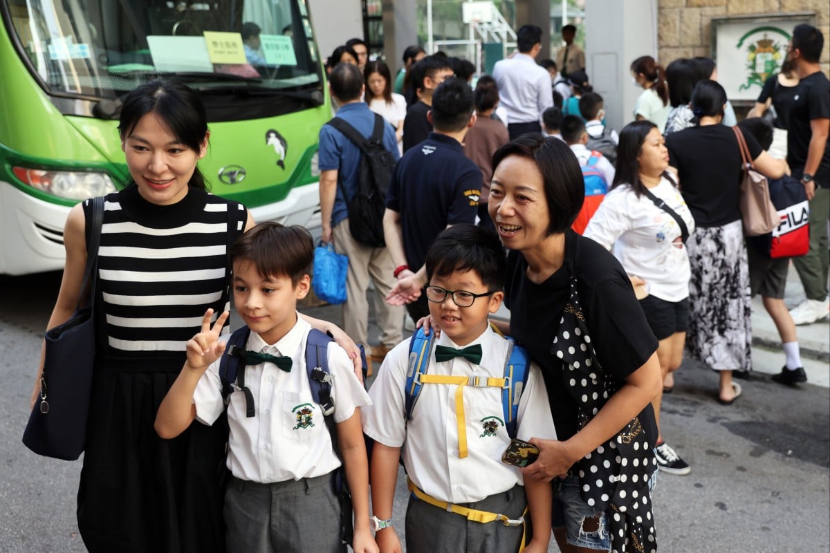 Students and parents at St Joseph’s College Primary School mark the first day of the new school year. Photo: Yik Yeung -man