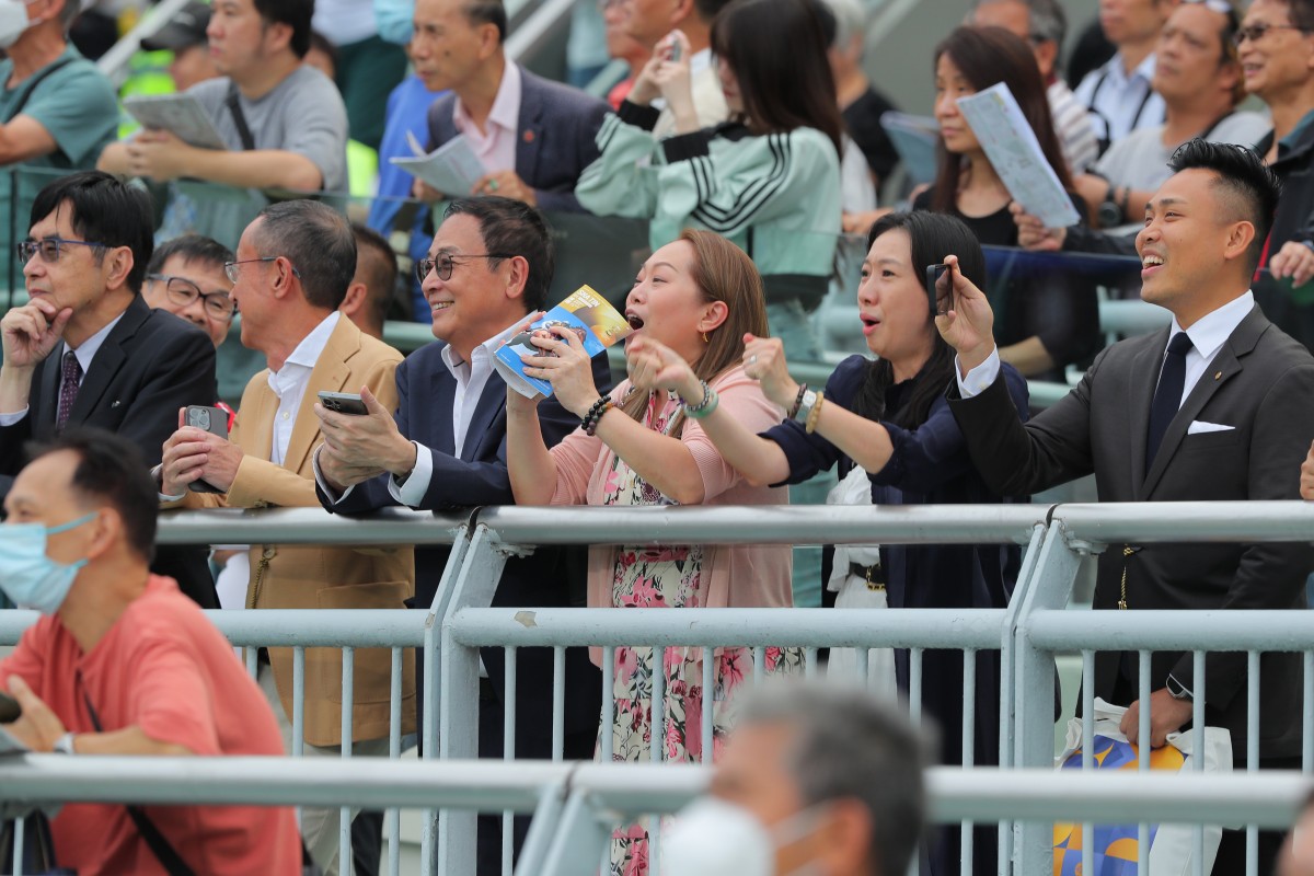 Spectators cheer on Supreme Lucky, ridden by Zac Purton, to victory in race nine at Sha Tin. Photo: Kenneth Chan.