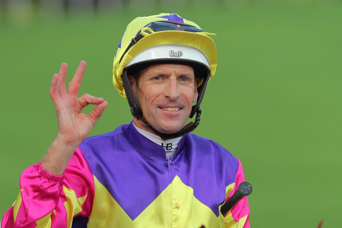 Hugh Bowman celebrates after ringing up his Sha Tin treble on Sunday. Photos: Kenneth Chan