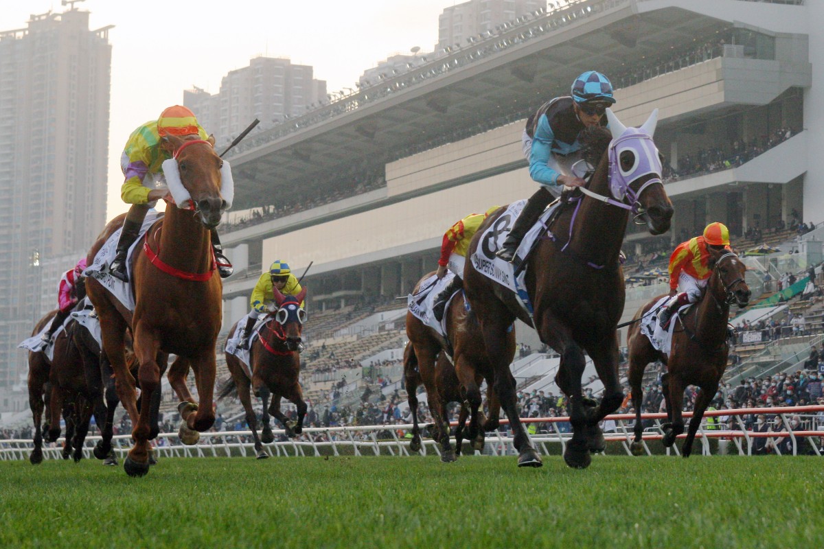 Super Sunny Sing (blue and black cap) wins February’s Classic Cup. Photos: Kenneth Chan