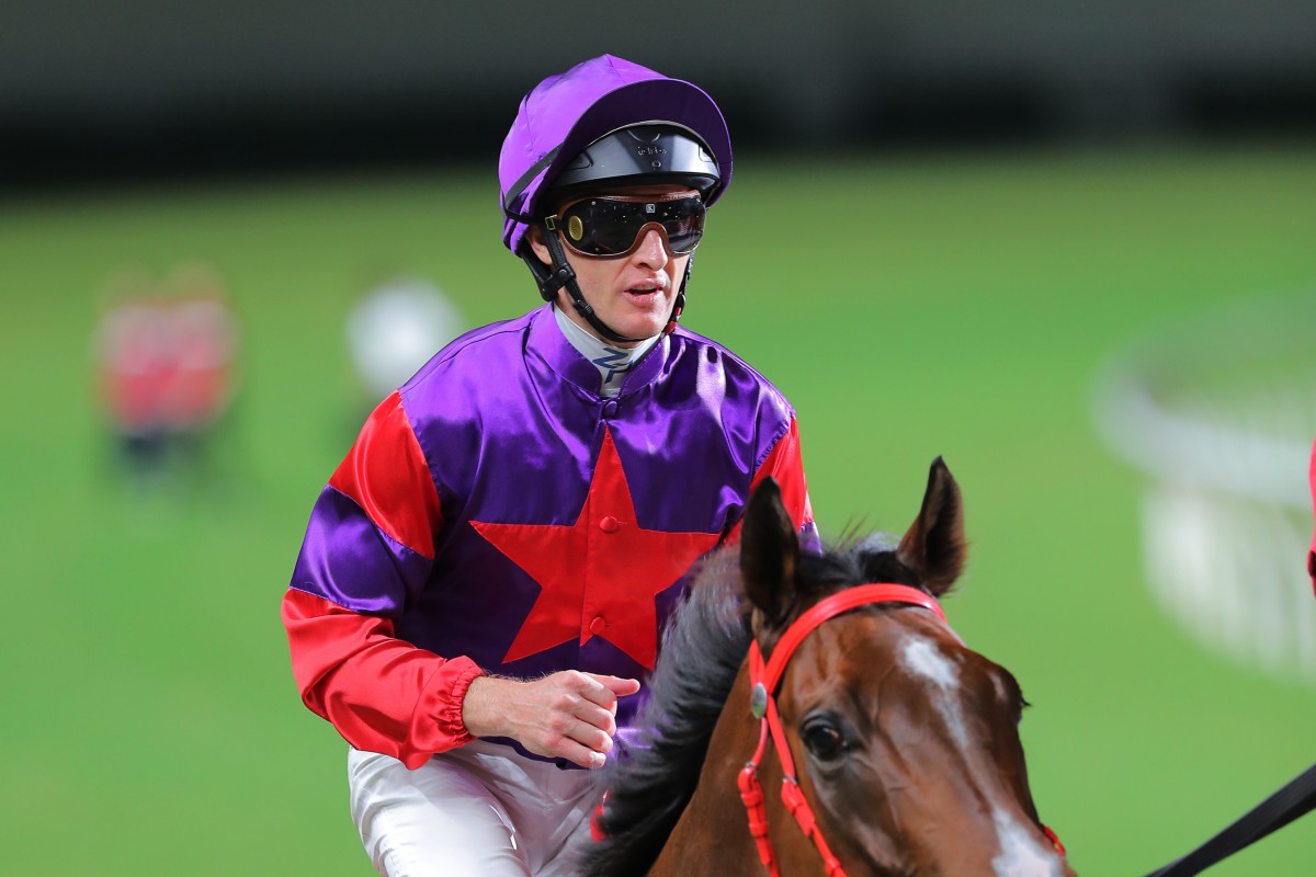 Zac Purton returns after his victory aboard Lightning Bolt at Happy Valley on Wednesday night. Photo: Kenneth Chan