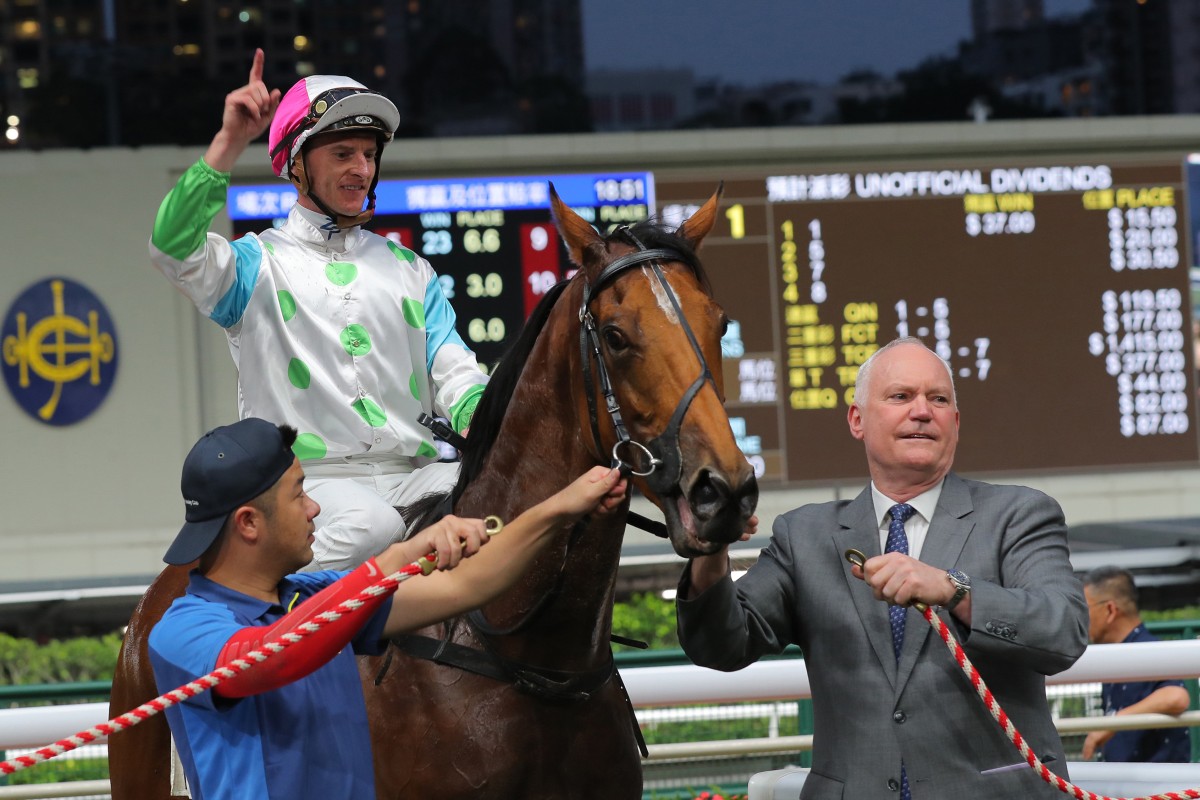 Zac Purton salutes as David Hall holds Gallant Hero at Happy Valley on April 19. Photos: Kenneth Chan