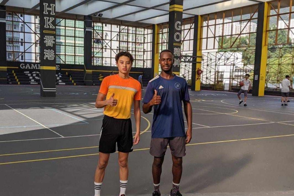 Moses Wu with trainer James Nortey (R) during his return to Hong Kong. Photo: Handout