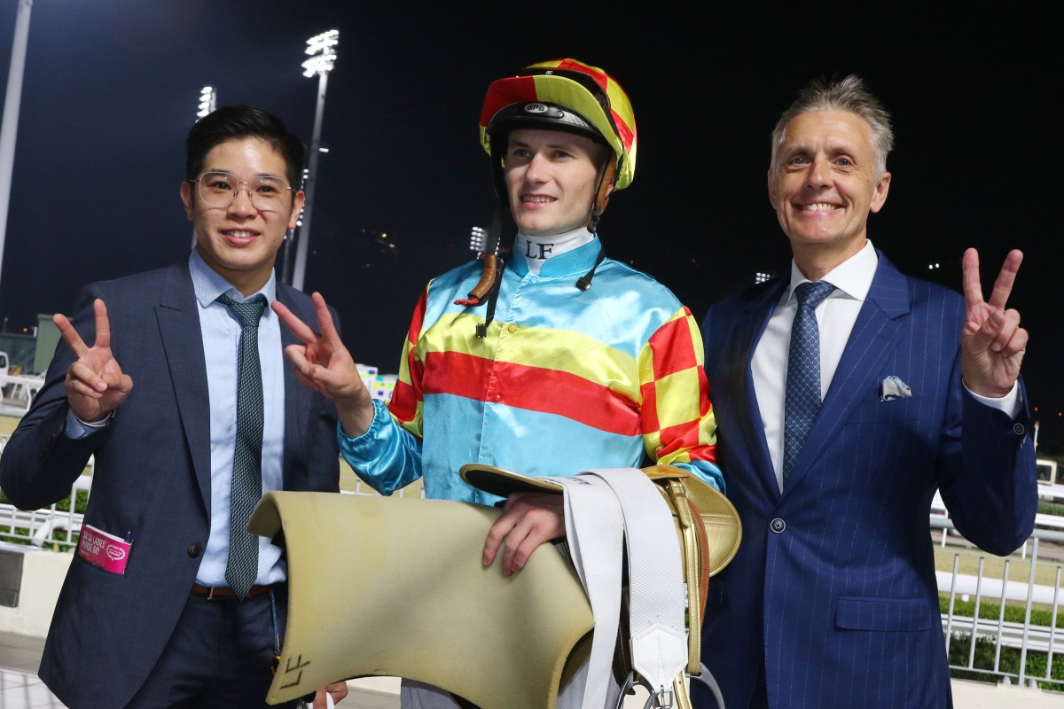 Mark Newnham celebrates his first Sha Tin winners with fellow double scorer Luke Ferraris. Photos: Kenneth Chan