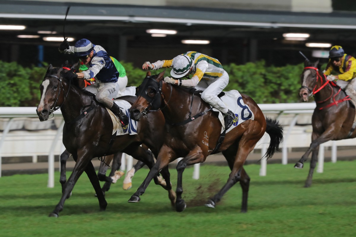 Tattenham (left) gets the better of Happy Trio at Happy Valley. Photo: Kenneth Chan.