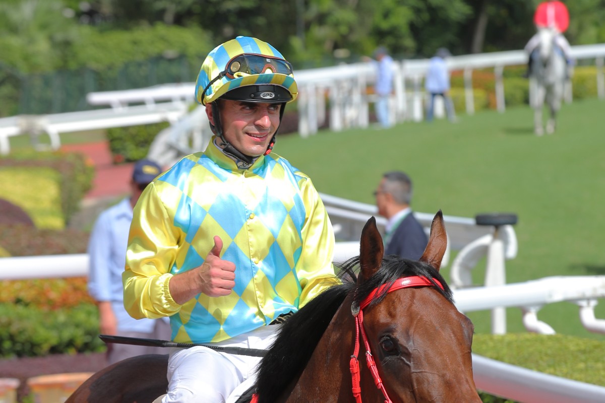 Andrea Atzeni is all smiles after his victory aboard Champion Method last month. Photo: Kenneth Chan