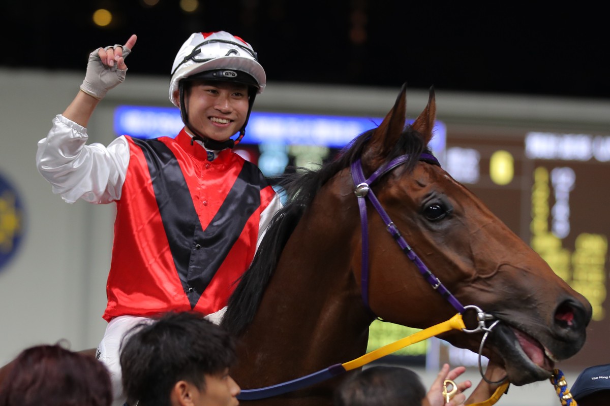 Dylan Mo celebrates aboard Multidarling at Happy Valley on Wednesday night. Photo: Kenneth Chan