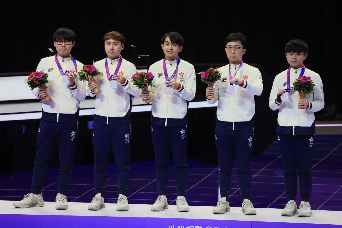 Hong Kong’s team won the silver medal in esports for the battle arena game, Dream Three Kingdoms 2, during the Hangzhou Asian Games. From left: Ivan Law Hing-lung, Jazkit Chan Cheuk-kit, Yip Ho-lam, Yuen Pak-lam, and Yip Wai-lam. Photo: Dickson Lee