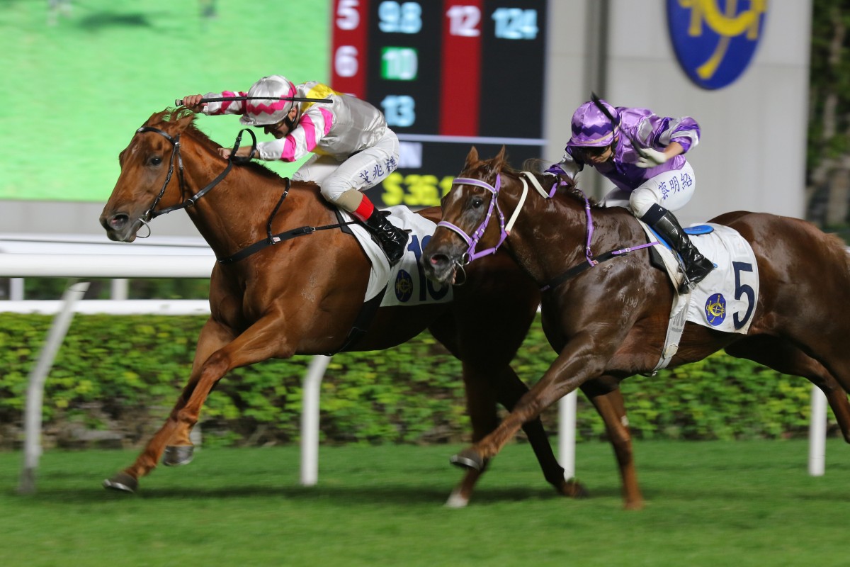 I Give (left) fends off a late challenge to make it five wins on the bounce at Sha Tin on Sunday. Photos: Kenneth Chan