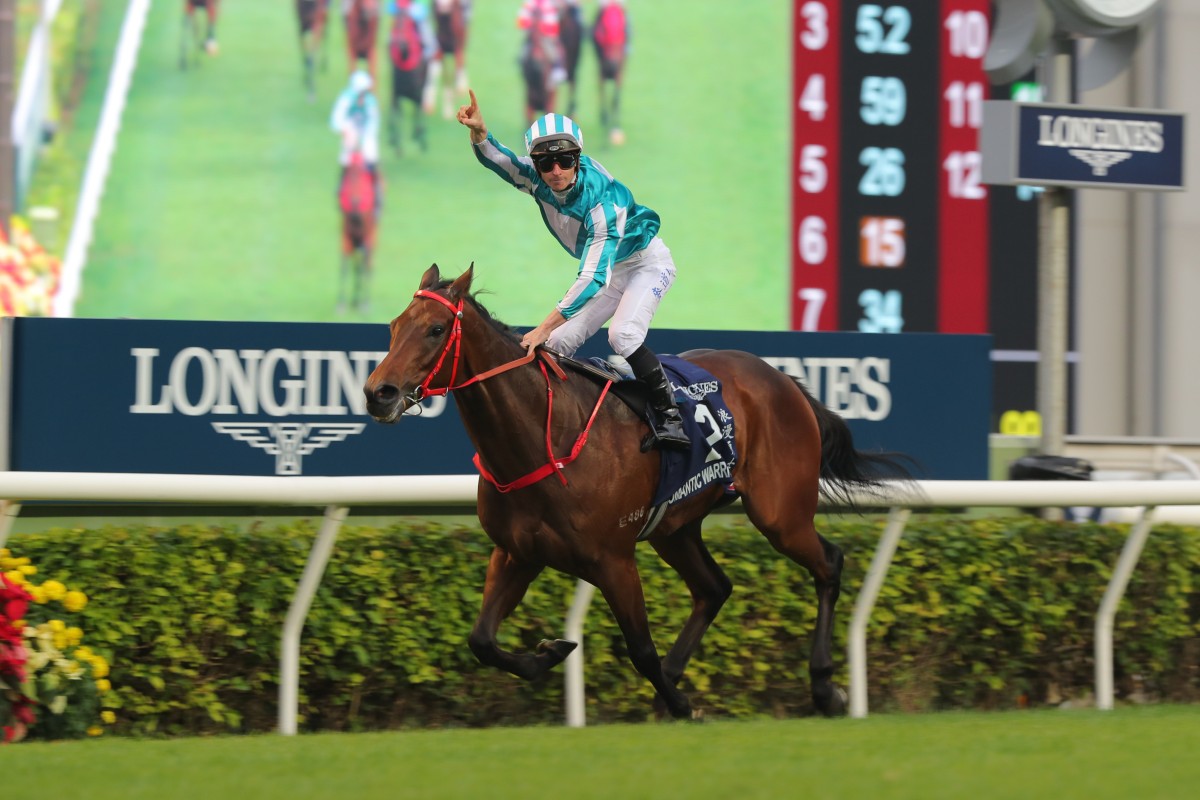 James McDonald salutes as Romantic Warrior wins the 2022 Hong Kong Cup. Photos: Kenneth Chan