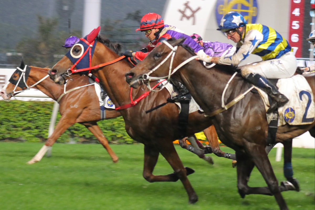 Happy Together (centre) scores a narrow Sha Tin win for Alexis Badel. Photos: Kenneth Chan