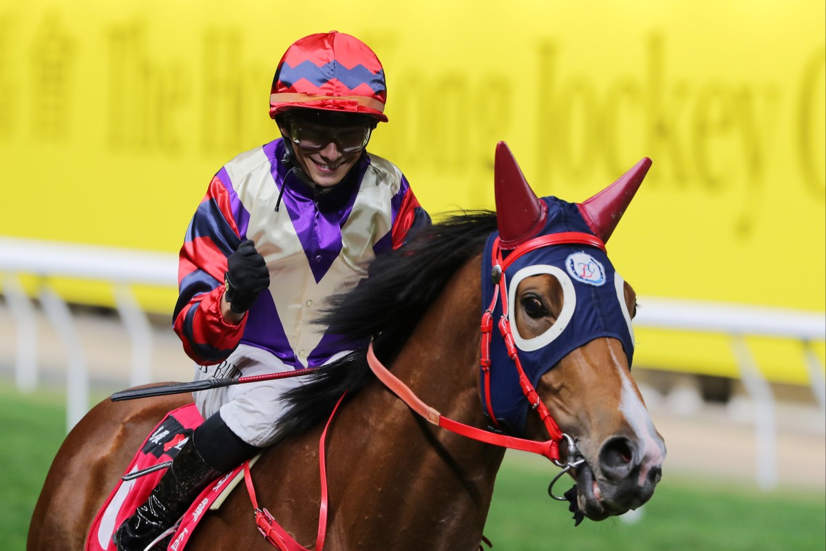 Alexis Badel celebrates Happy Together’s win in the Group Three January Cup (1,800m) at Happy Valley. Photo: Kenneth Chan
