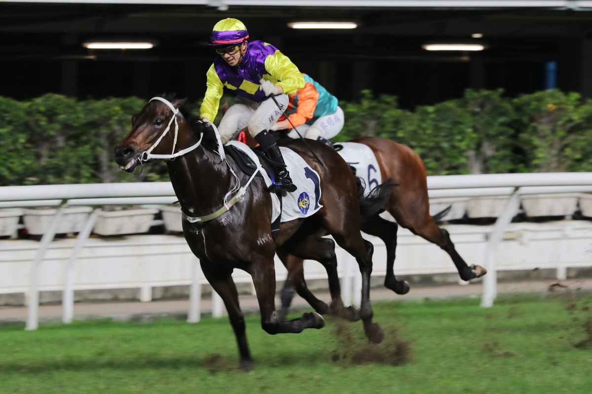Angus Chung graduates from his apprenticeship after booting home Colourful Emperor at Happy Valley. Photo: Kenneth Chan