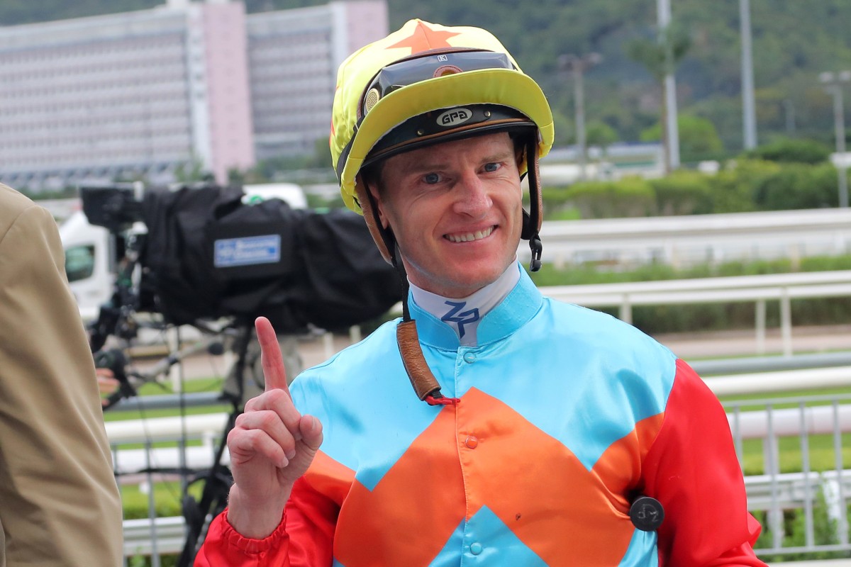 Zac Purton is all smiles after notching his 100th win of the season on Ka Ying Rising, Photos: Kenneth Chan