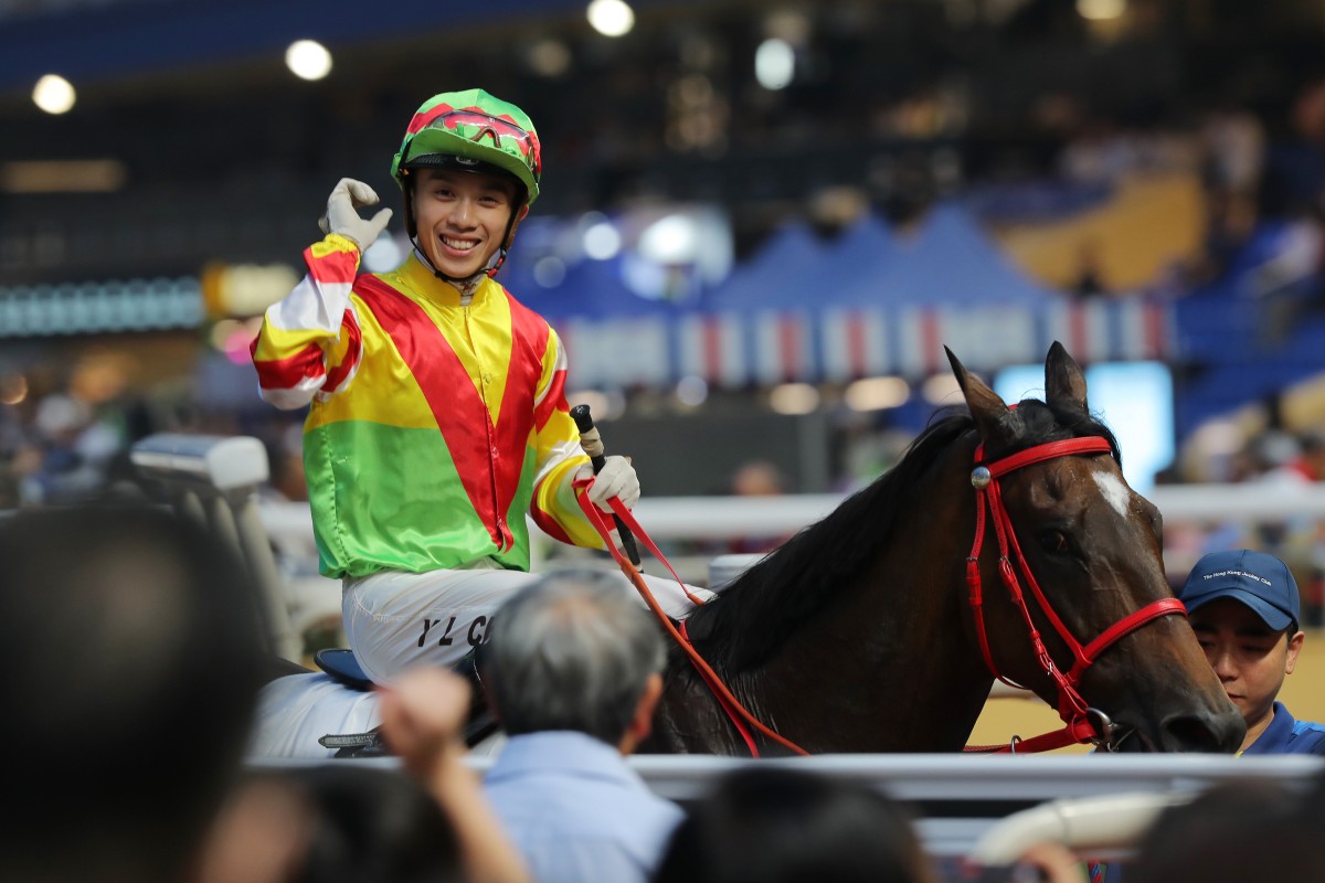 Angus Chung is all smiles after saluting aboard Hero Star on Wednesday night. Photos: Kenneth Chan