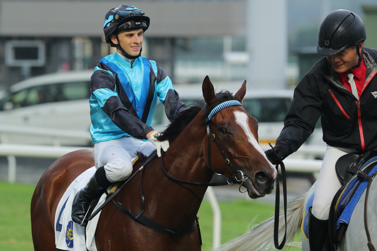 Lyle Hewitson is all smiles after saluting aboard Full Credit at Sha Tin on Sunday. Photos: Kenneth Chan