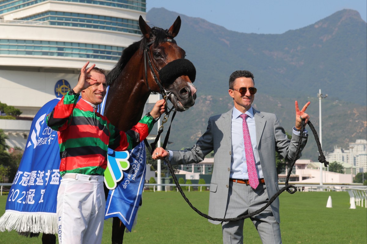 Jockey Hugh Bowman and trainer Douglas Whyte with Russian Emperor after his win in the 2023 Group One Champions & Chater Cup (2,400m). Photo: Kenneth Chan