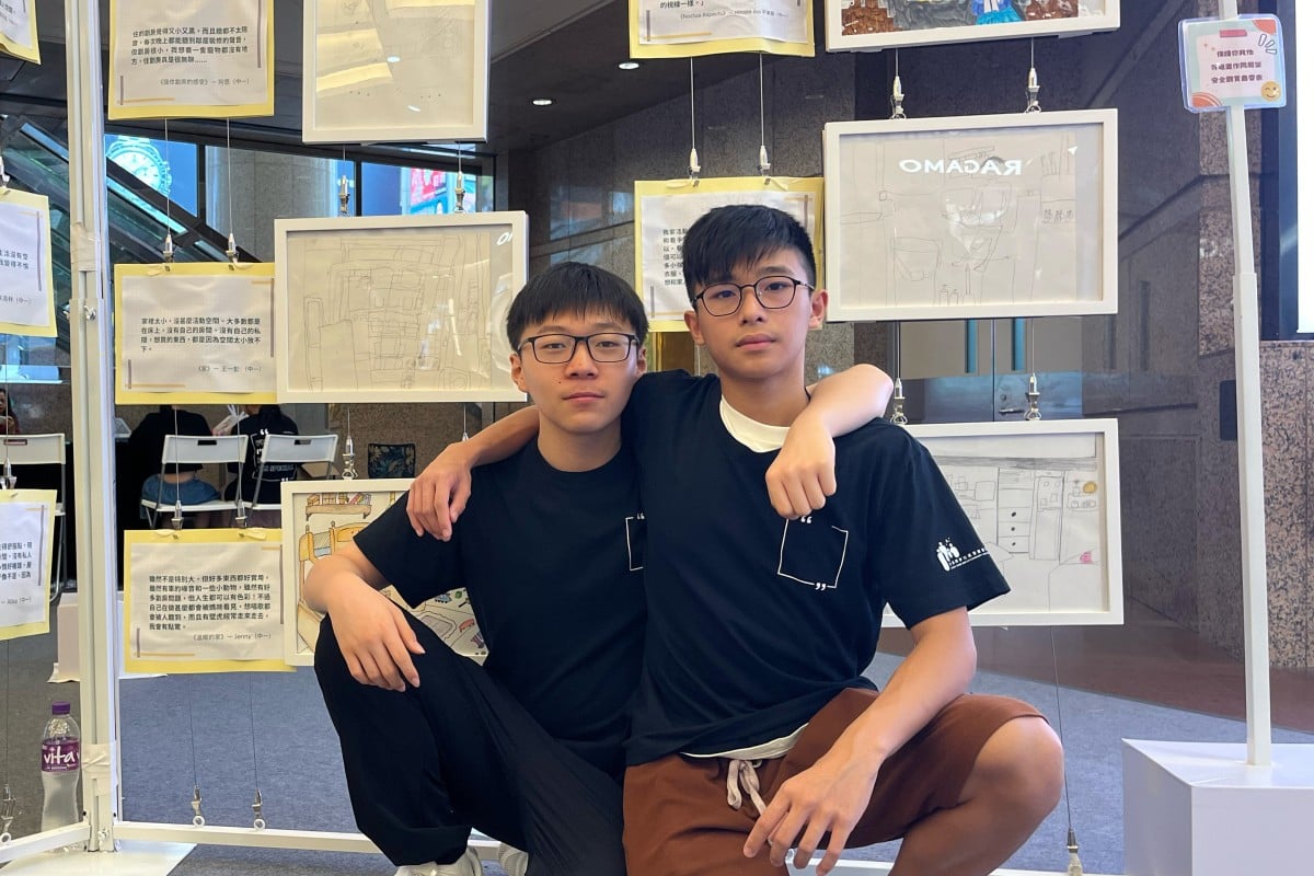 Secondary school students Matthew Wang (left) and Gordan Jian have written stories and created drawings to reflect their experiences living in subdivided flats. Photo: Kelly Fung