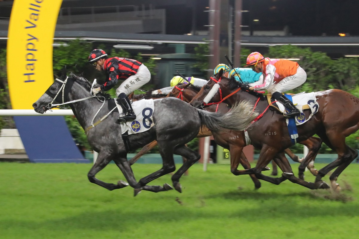 Outgate surges home to score at the Valley under Angus Chung. Photos: Kenneth Chan