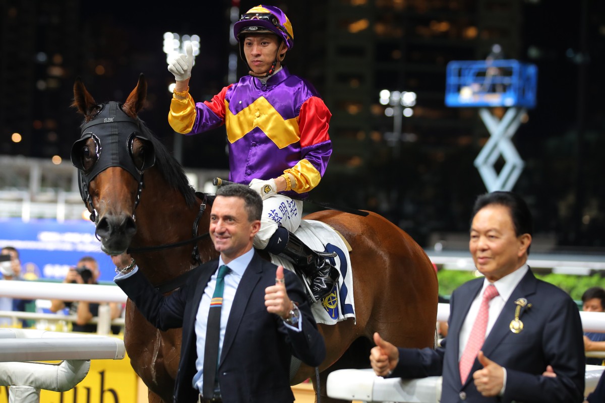 Douglas Whyte and Matthew Chadwick with Lucky Planet after his Happy Valley win. Photos: Kenneth Chan