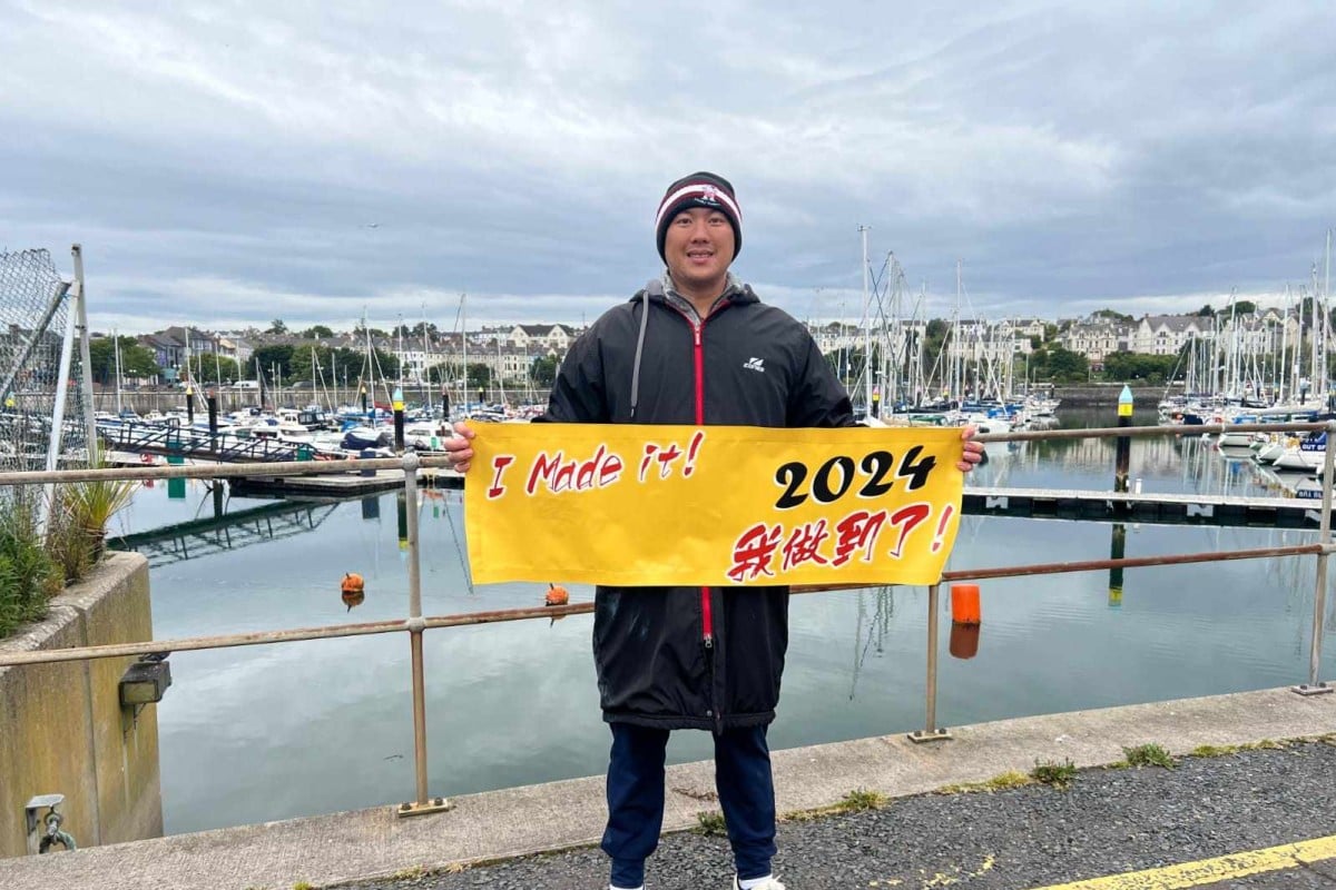 Ryan Leung Chun-hay poses after completing his 40km swim across the North Channel. Photo: Handout
