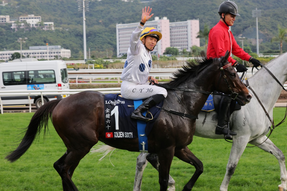 Vincent Ho waves to the Sha Tin crowd after winning the Hong Kong Mile on Golden Sixty last December. Photos: Kenneth Chan