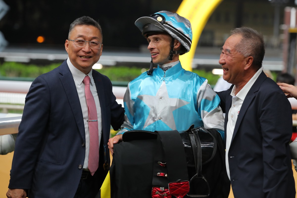 Trainer Francis Lui (left) and jockey Lyle Hewitson (right) enjoy Sweet Briar’s Happy Valley win. Photo: Kenneth Chan