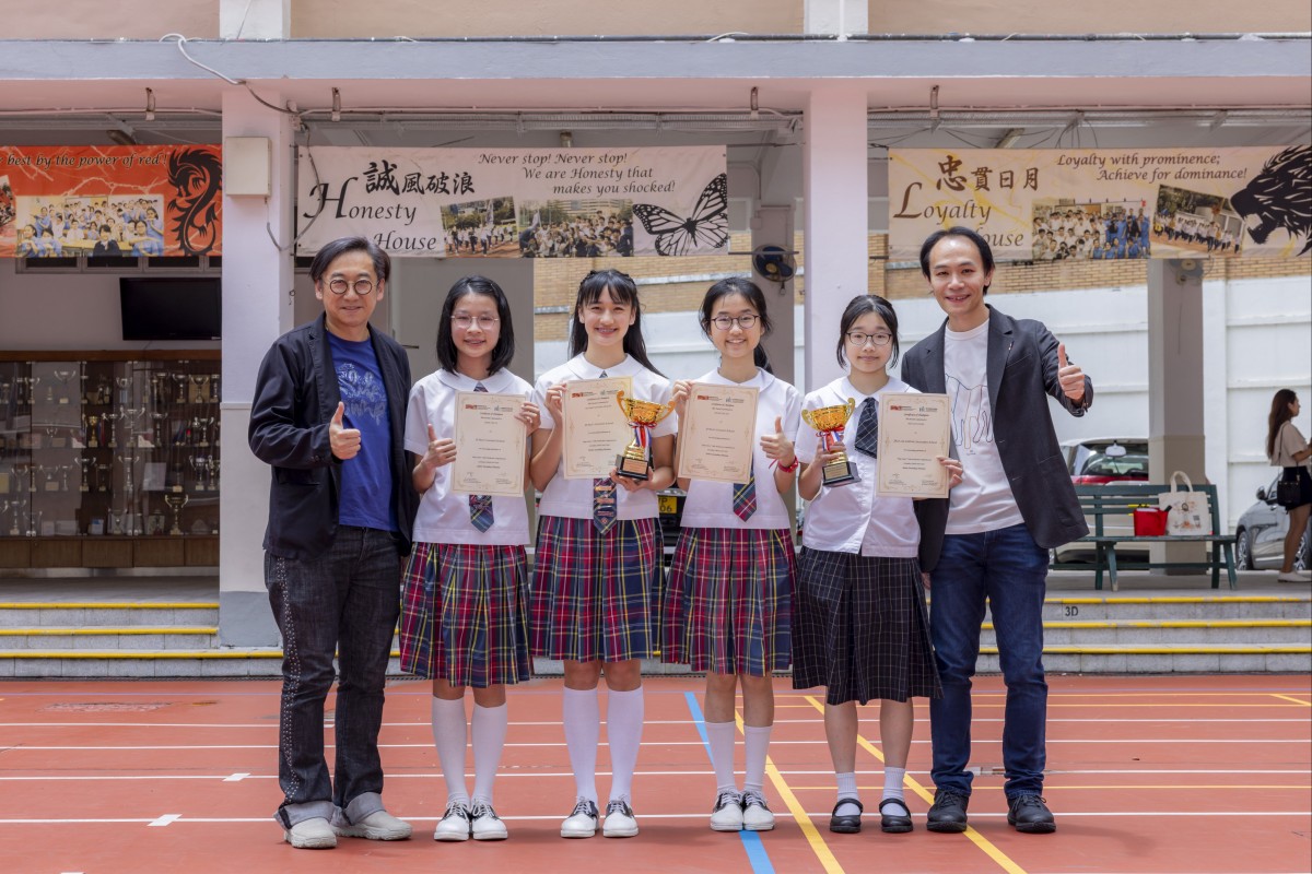 Dr Leslie Lam (left) and Robert Lui (right) served as judges and presented awards to the winning teams on behalf of the Council. Photo: Handout
