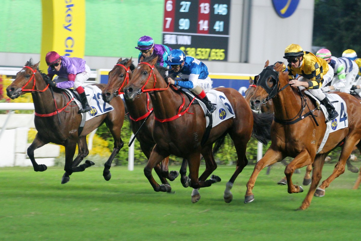 Lucky With You (centre) storms home to win under Andrea Atzeni last year. Photos: Kenneth Chan