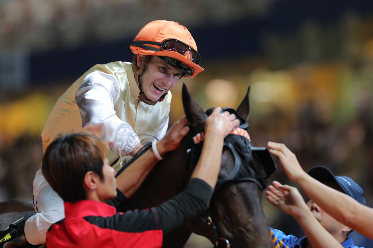 Luke Ferraris gives Colonel a pat after their victory last month. Photo: Kenneth Chan