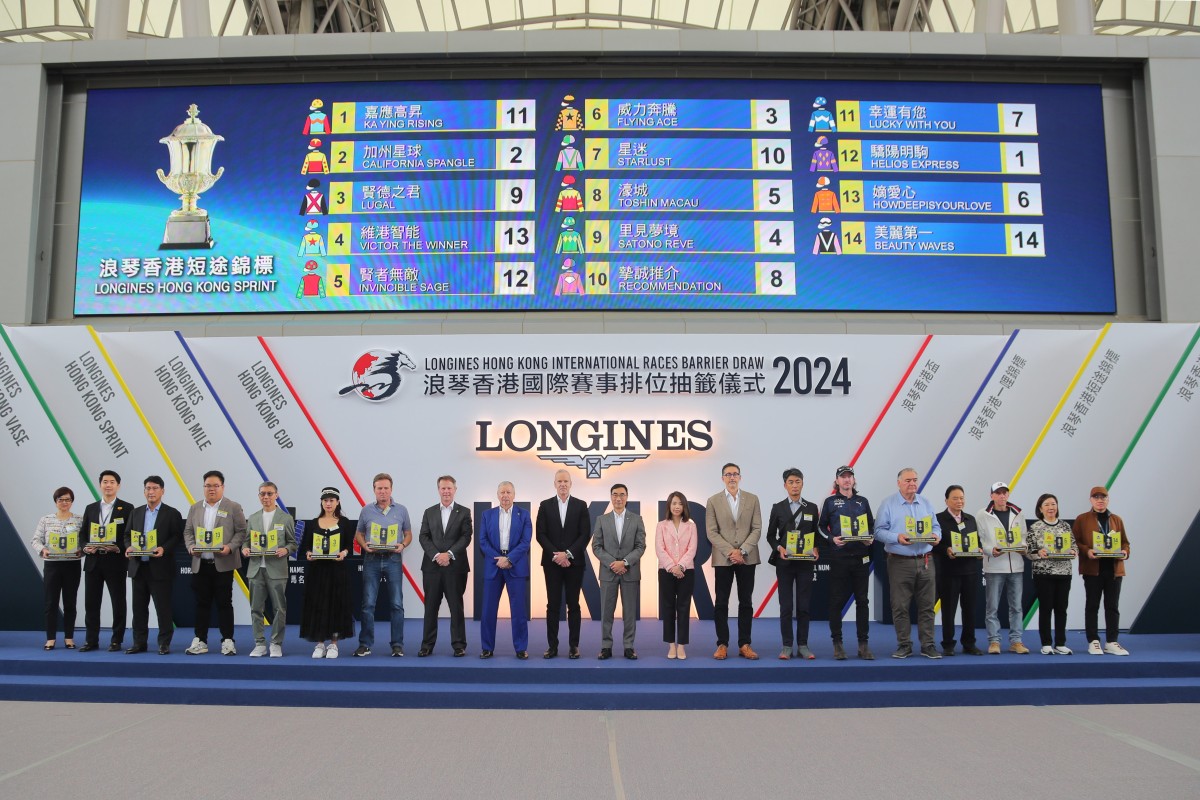 Connections and officials pose for photos after the Group One Hong Kong Sprint (1,200m) barrier draw at Sha Tin on Thursday. Photos: Kenneth Chan