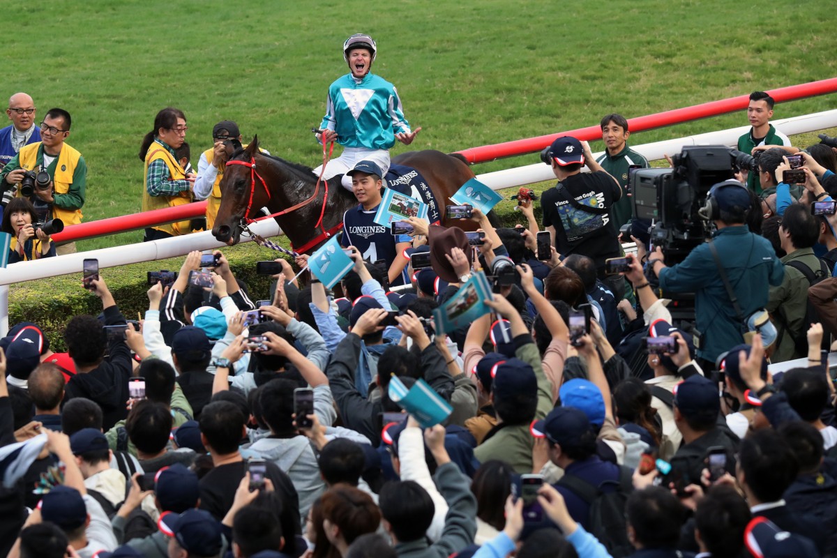 James McDonald revs up the crowd after Romantic Warrior’s record win in Sunday’s Hong Kong Cup at Sha Tin. Photos: Kenneth Chan