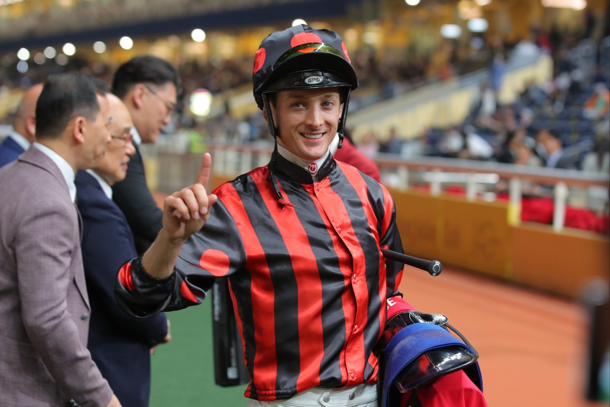 Harry Bentley soaks up his 100th Hong Kong winner at Happy Valley on Wednesday night. Photos: Kenneth Chan