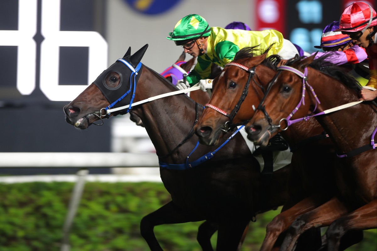 Sky Trust stays on to win narrowly under Lyle Hewitson at Sha Tin. Photos: Kenneth Chan