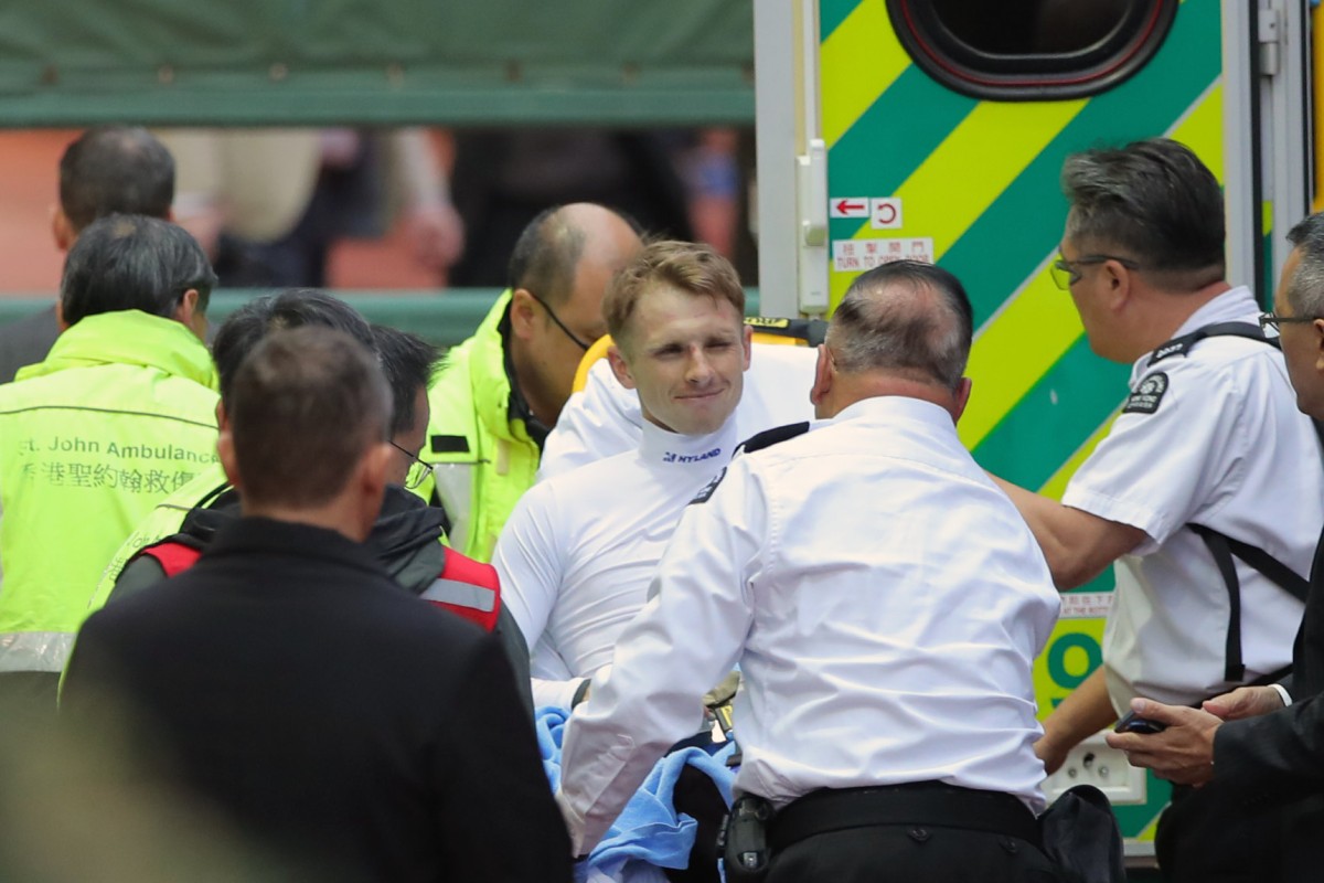 Jockey Lyle Hewitson on a stretcher after Sunday’s fall. Photo: Kenneth Chan