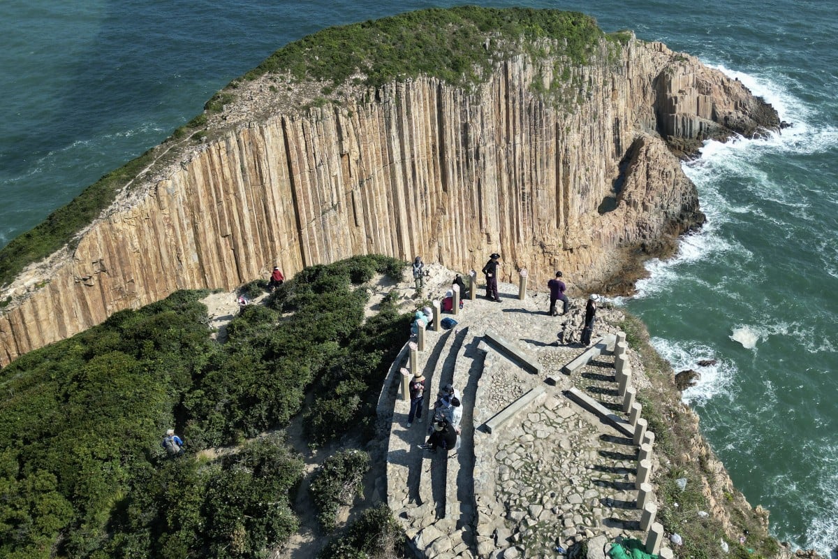 Hikers visit the Po Pin Chau Viewing Platform next to the High Island Reservoir in Sai Kung East Country Park. Photo: Sam Tsang