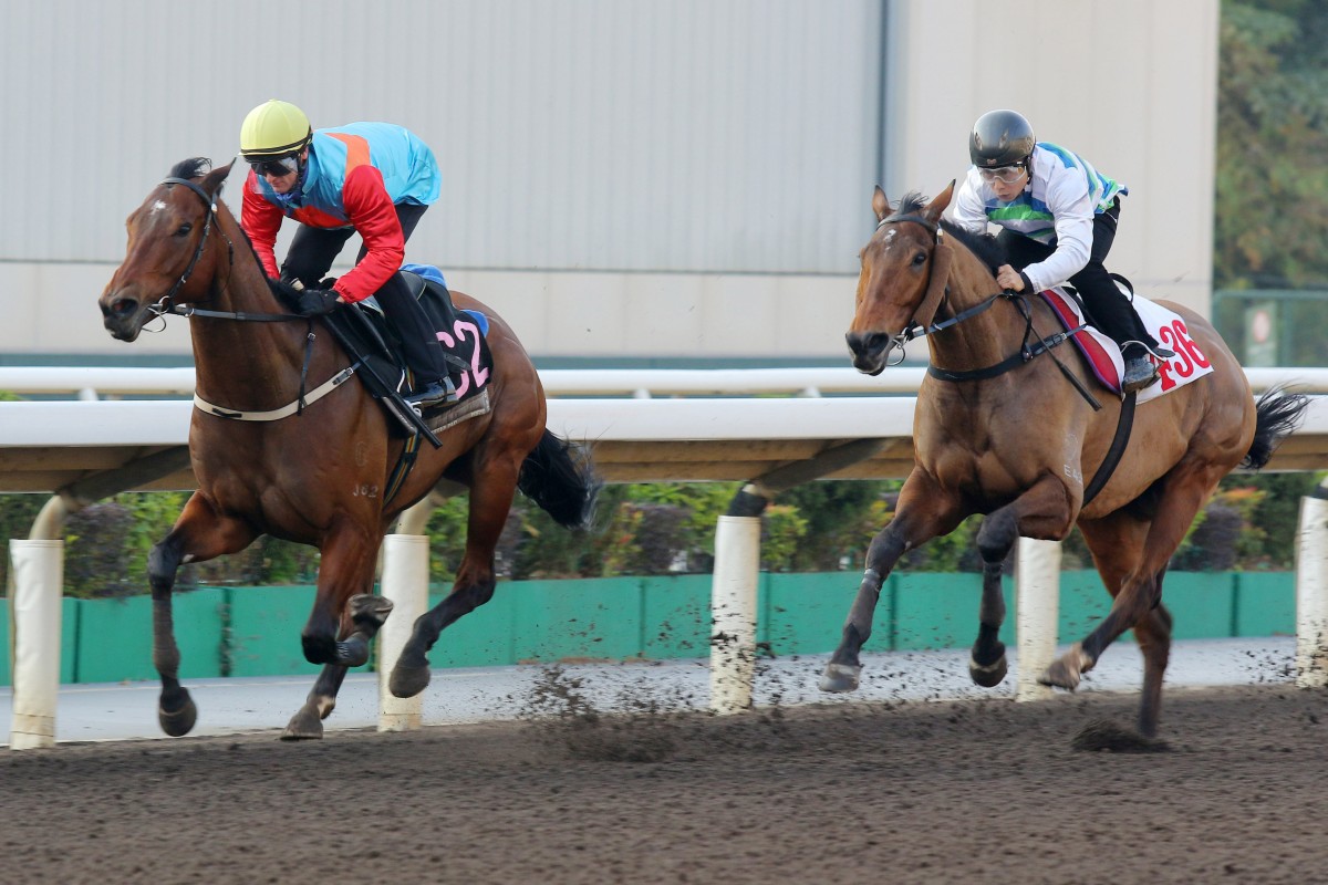 Ka Ying Rising (left) leads Voyage Bubble home at Sha Tin on Thursday morning. Photos: Kenneth Chan