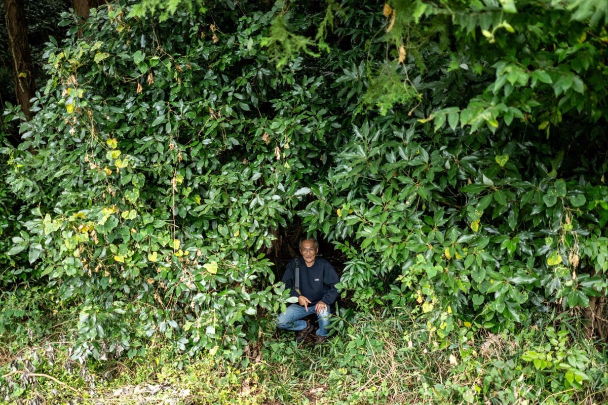 “Poopmaster” Masana Izawa entering his forest in Sakuragawa, Ibaraki Prefecture, Japan. Photo: AFP