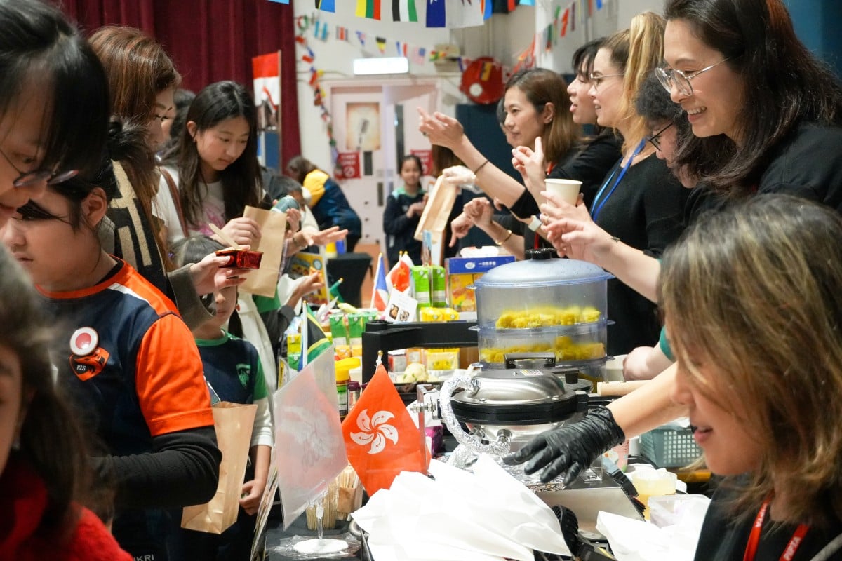 Korean International School’s international section held events – like the cultural fair at the primary school pictured here – to support Operation Santa Claus. Photo: Handout