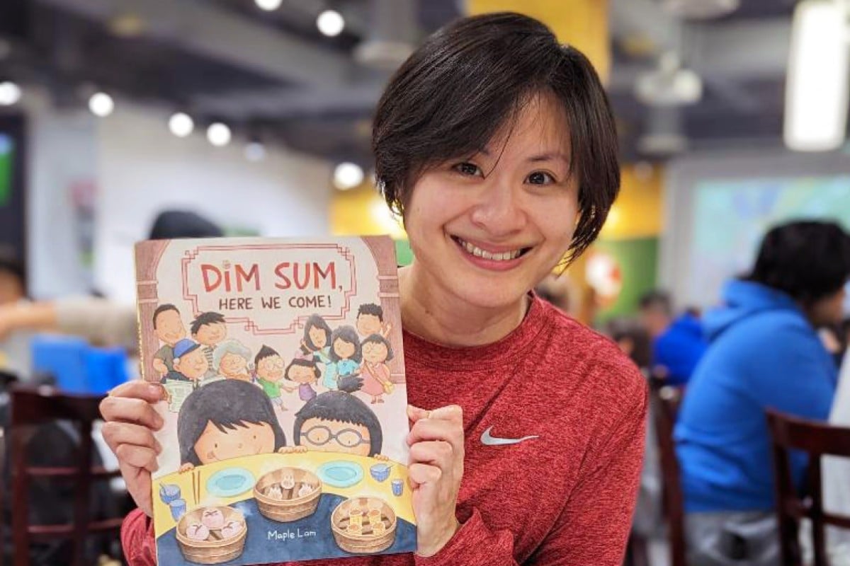 Writer and illustrator Maple Lam shows off her book “Dim Sum, Here We Come!”. Photo: Handout