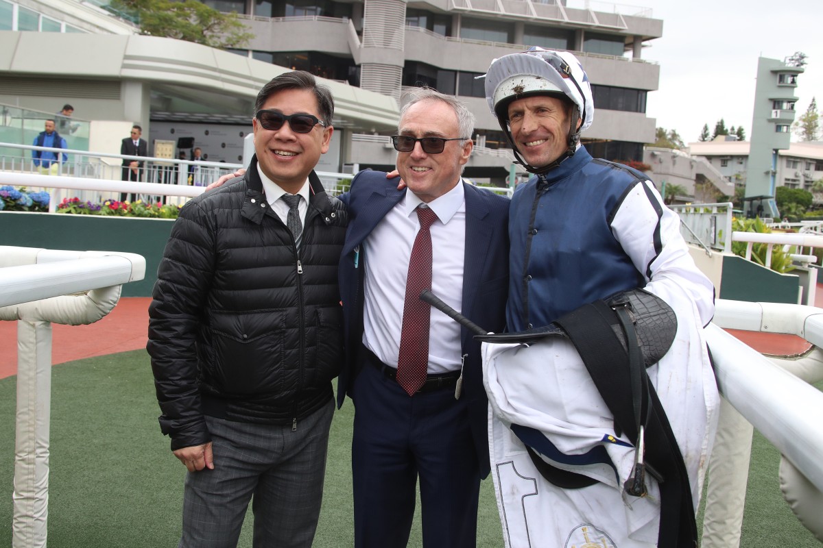 Dennis Yip (left), Paul O’Sullivan and jockey Hugh Bowman after Fast Network’s dominant win. Photos: Kenneth Chan