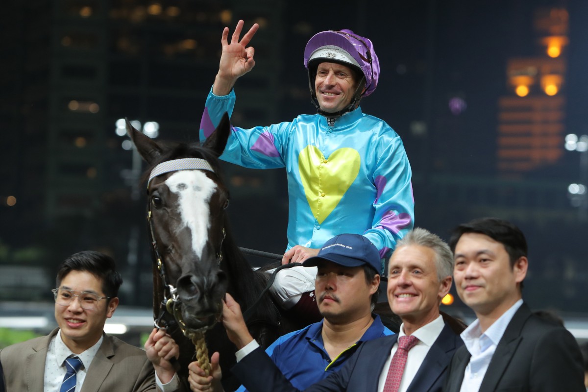 Hugh Bowman celebrates his third  win at Happy Valley on Wednesday night on Casa Rochester. Photos: Kenneth Chan