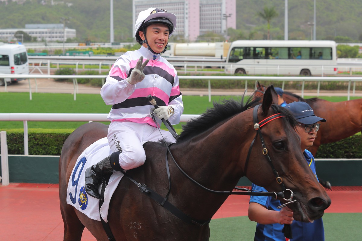 Angus Chung celebrates a treble at Sha Tin on Sunday after booting home Divano. Photos: Kenneth Chan