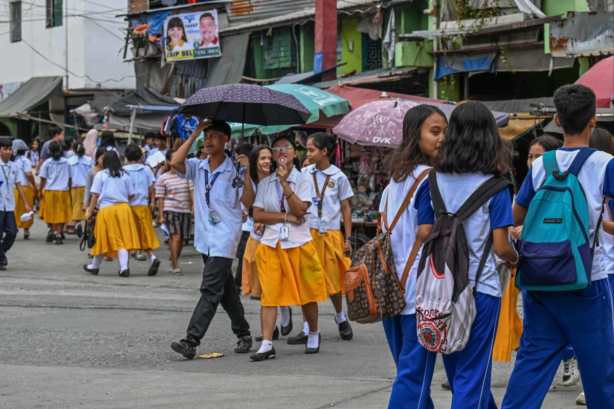 Last year, heatwaves forced millions of children in the Philippines out of school, prompting a series of changes. Photo: AFP
