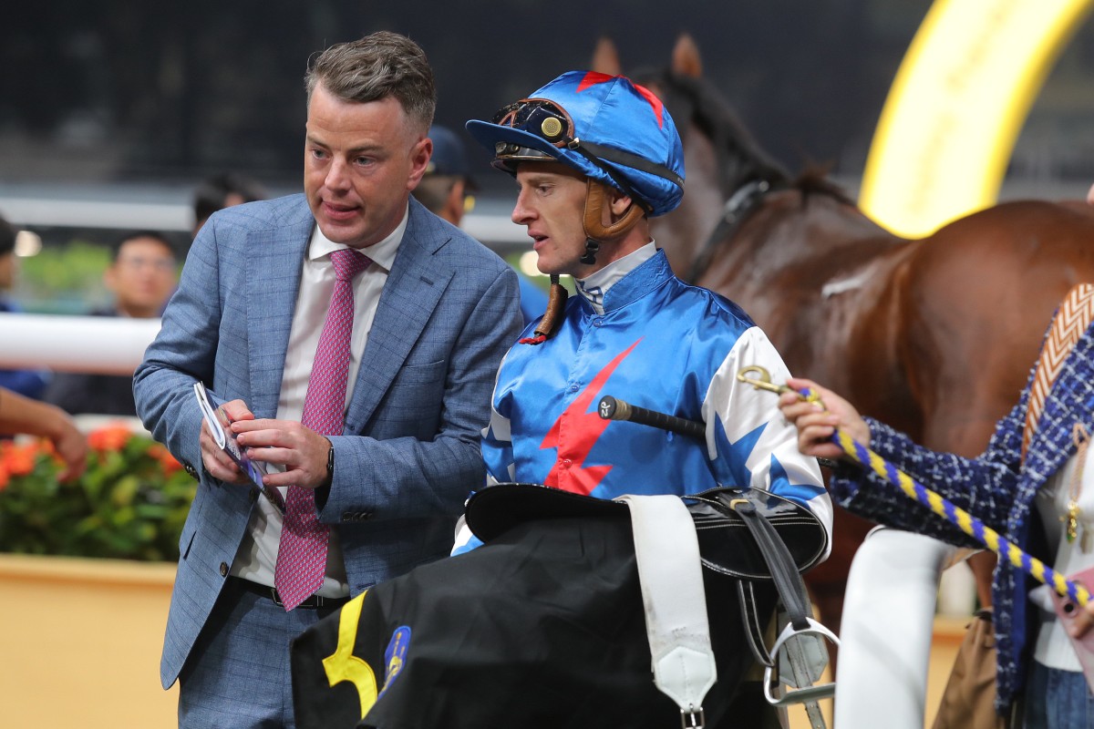 Trainer Jamie Richards and jockey Zac Purton debrief after combining to win with Sunday’s Serenade at Happy Valley. Photos: Kenneth Chan