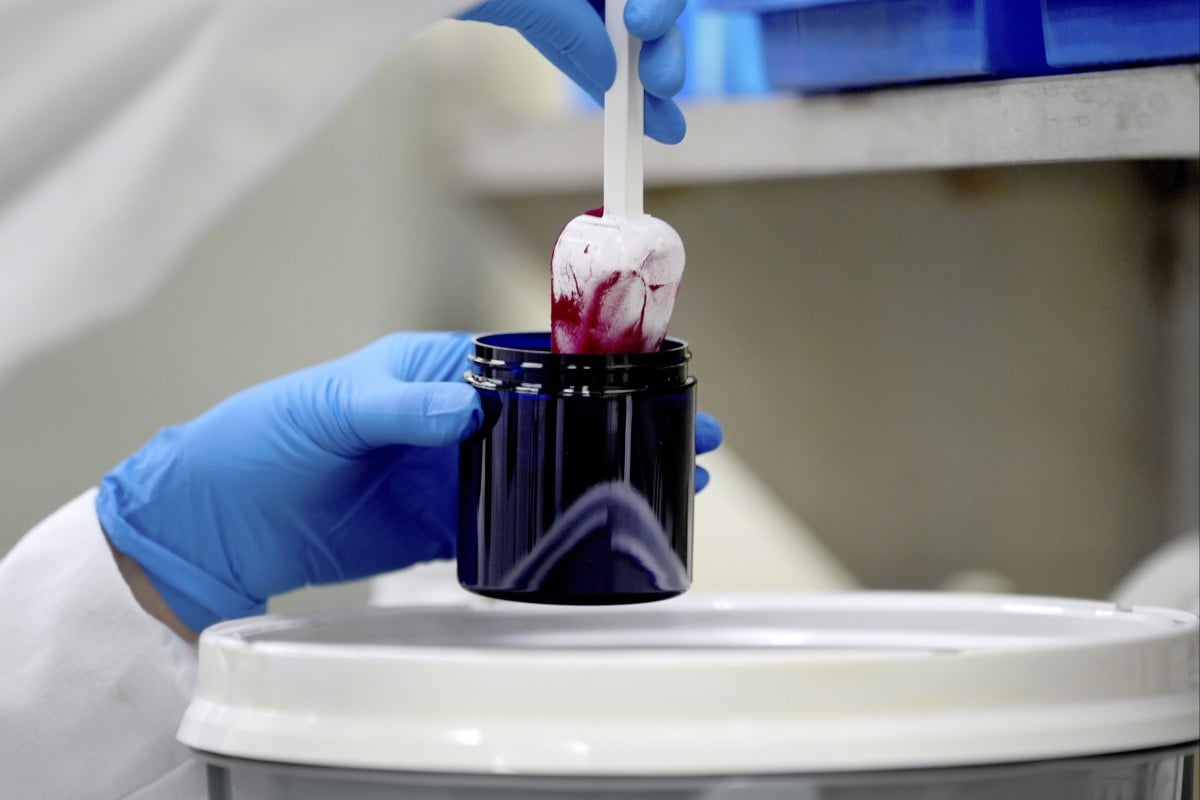 Technician Heather Browning packages a colour sample made of beetroot powder for a customer at Sensient Technologies Corp, a colour additive manufacturing company in the US. Photo: AP