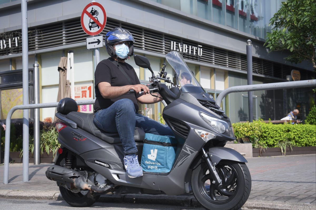 Sunny Waseem*, a food delivery rider in the industry for six years, calls the work “exhausting” and intense. Photo: Elson Li