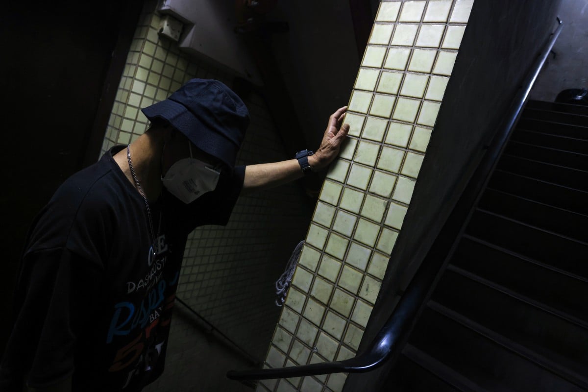 Restaurant worker Wong* (full name not given), in Sham Shui Po. Over the past six months, 200 restaurant employees, including Wong, have reported being sacked and replaced by workers who came to the city via an import scheme. Photo: Jonathan Wong