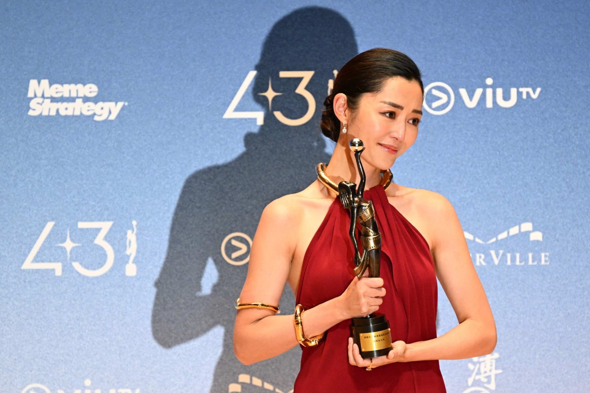 Hong Kong actress Michelle Wai holds up her trophy for Best Actress at the 43nd Hong Kong Film Awards in Hong Kong on April 27, 2025. Photo: AFP